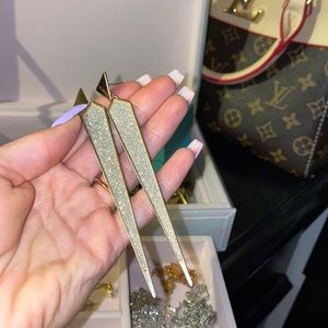 Gold earrings with silver shimmer